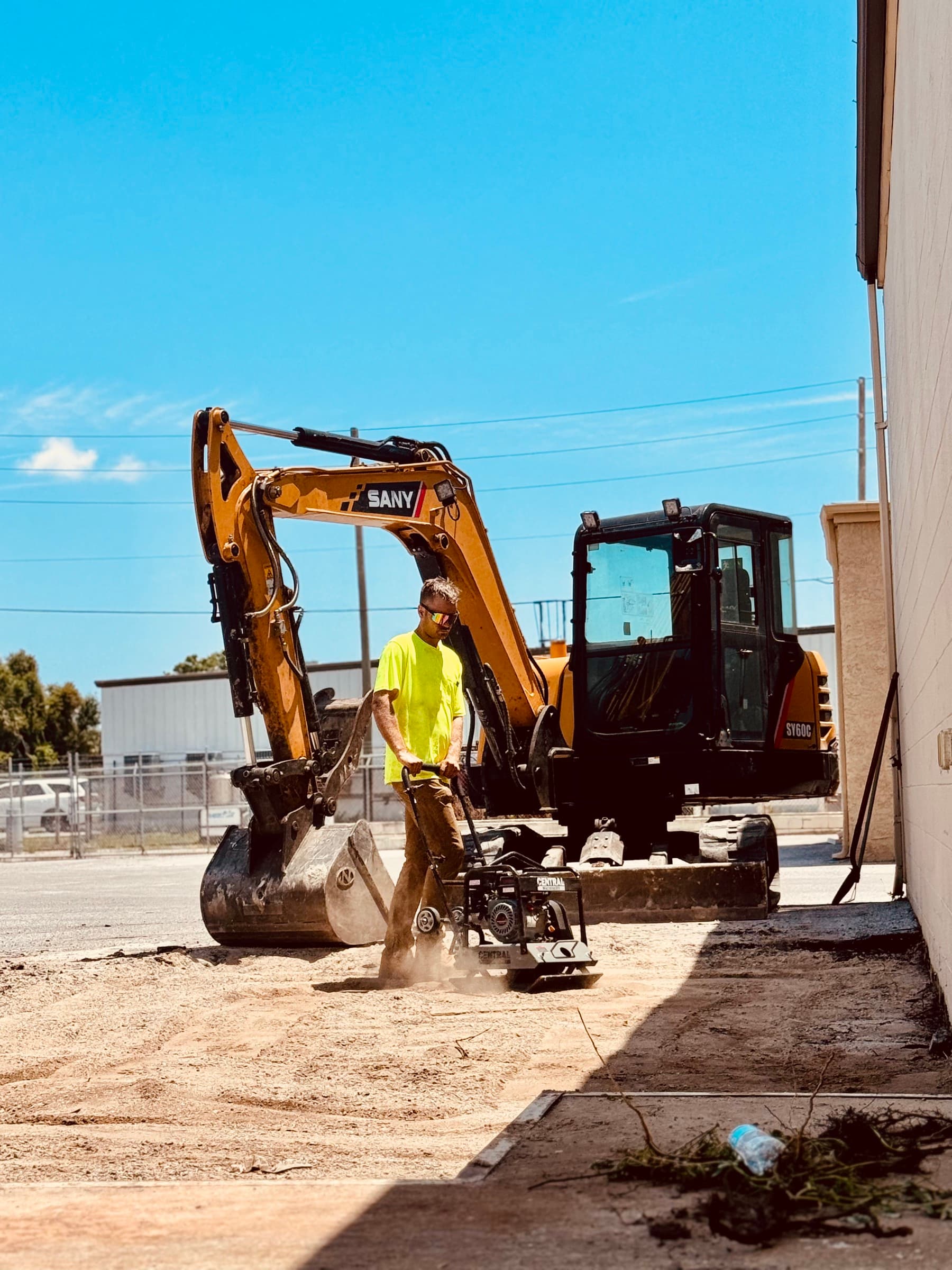 Mojo crew coordinating demolition, hauling, and site preparation work